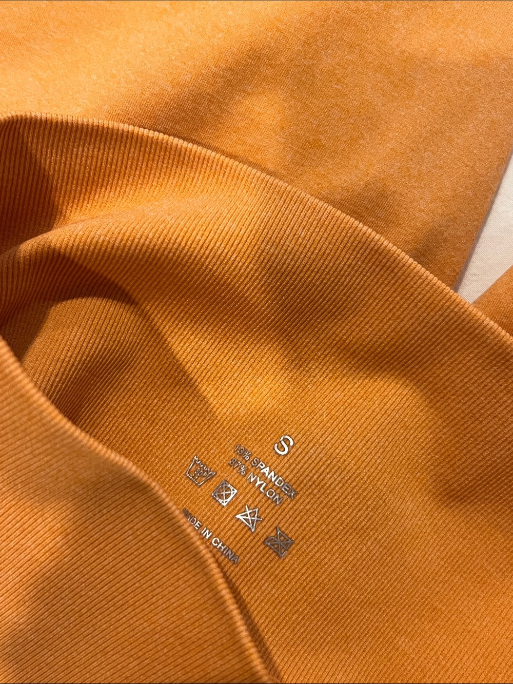 NVGTN Orange Leggings with Contour Seams - Picture 2 of 2